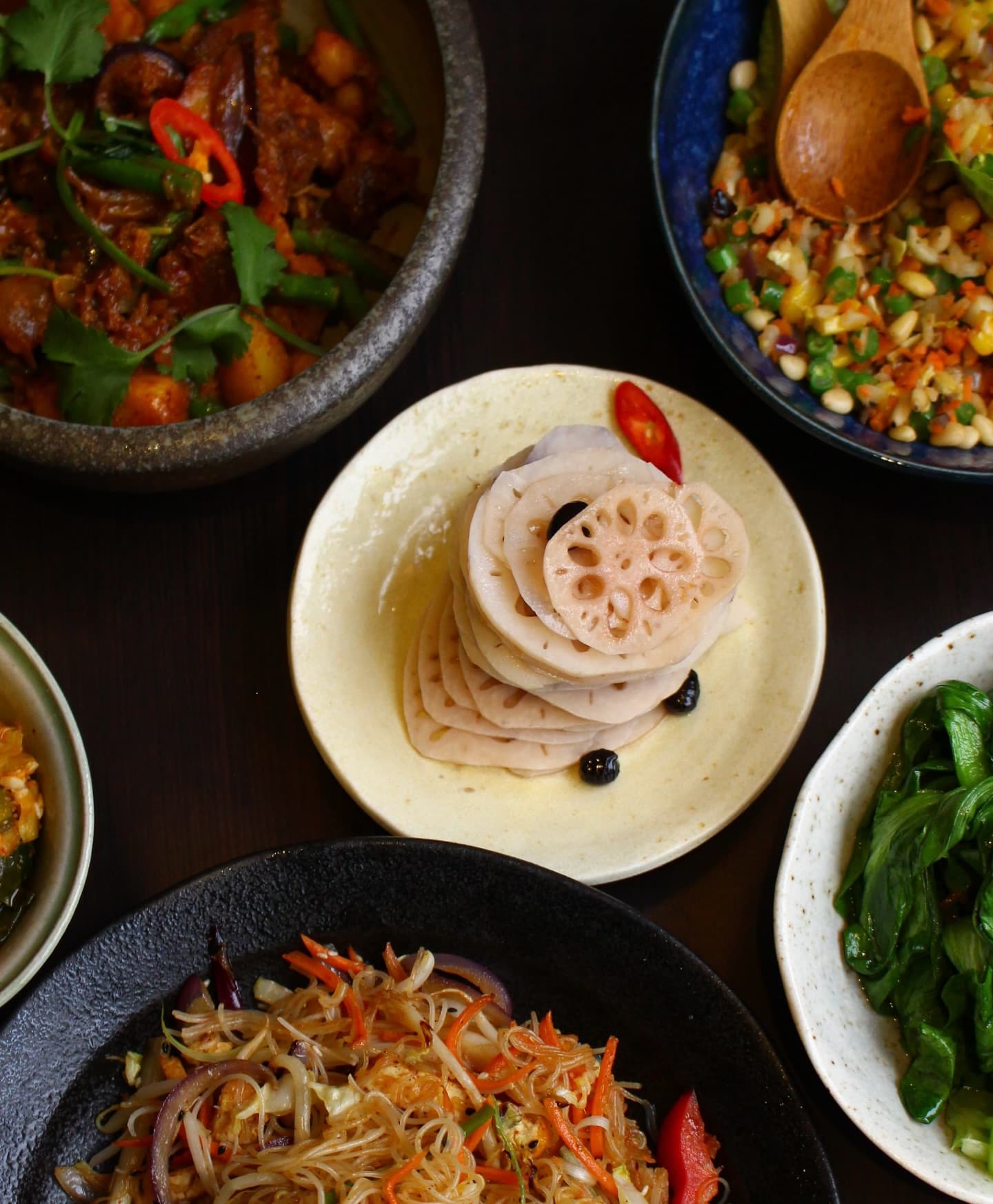 A colourful Suissi Vegan Kitchen sharing table